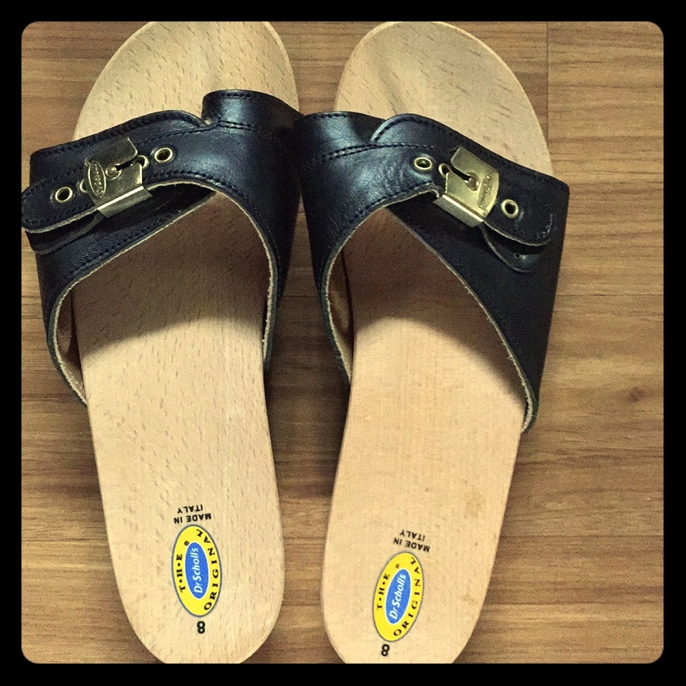 Dr. Scholl’s wood based sandals.